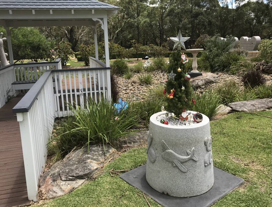 Messages of remembrance: Woronora Memorial Park have erected Christmas trees in their children’s areas to allow families and friends to place a decoration or message in their child’s memory.