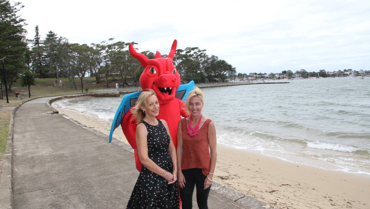 Celebration: Georges River Council's deputy mayor Kathryn Landsberry and Australia Day ambassador Susie Moroney with Georgie the Dragon are ready to celebrate at Carss Bush Park.