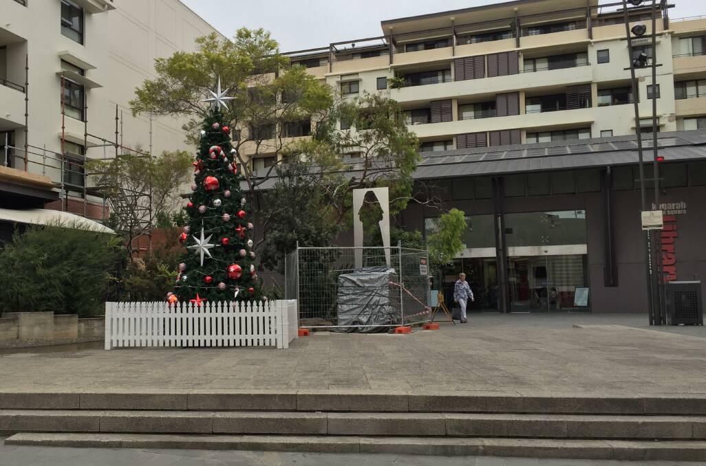 Pining for company: This Christmas tree is the sole reminder in Kogarah Town Square that it is the festive season.