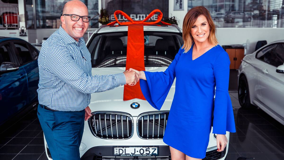 Happy to be on board: Sylvania BMW dealer principal Anthony Rodriquez and new ambassador Kylie Gillies.
