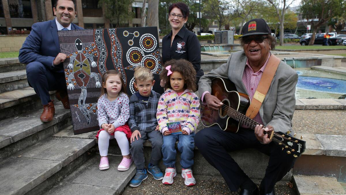 Celebrate: left to right, Sutherland Shire mayor Carmelo Pesce, Kurranulla Aboriginal Corporation manager Maxine Hodges, children from Moore Street Kindergarten, Sienna, Grayson and Taj, and singer Col Hardy. Picture: John Veage
