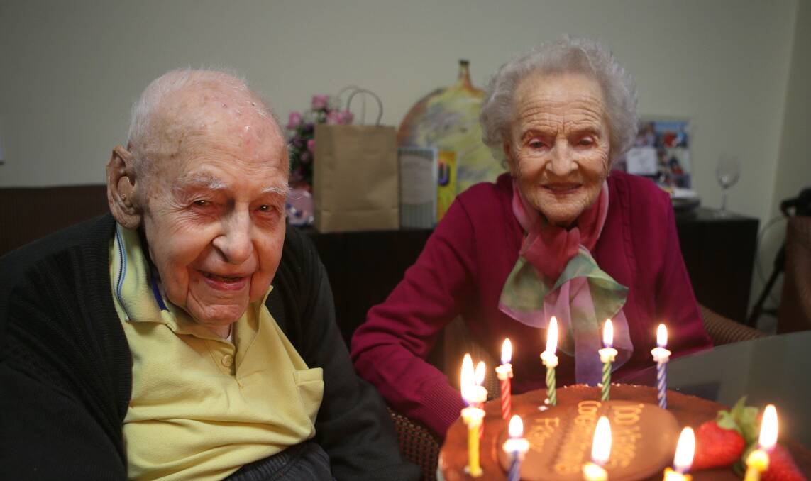 Devoted: Frank Trinder celebrates his 100th birthday with his wife of almost 75 years, Rose. Picture: John Veage