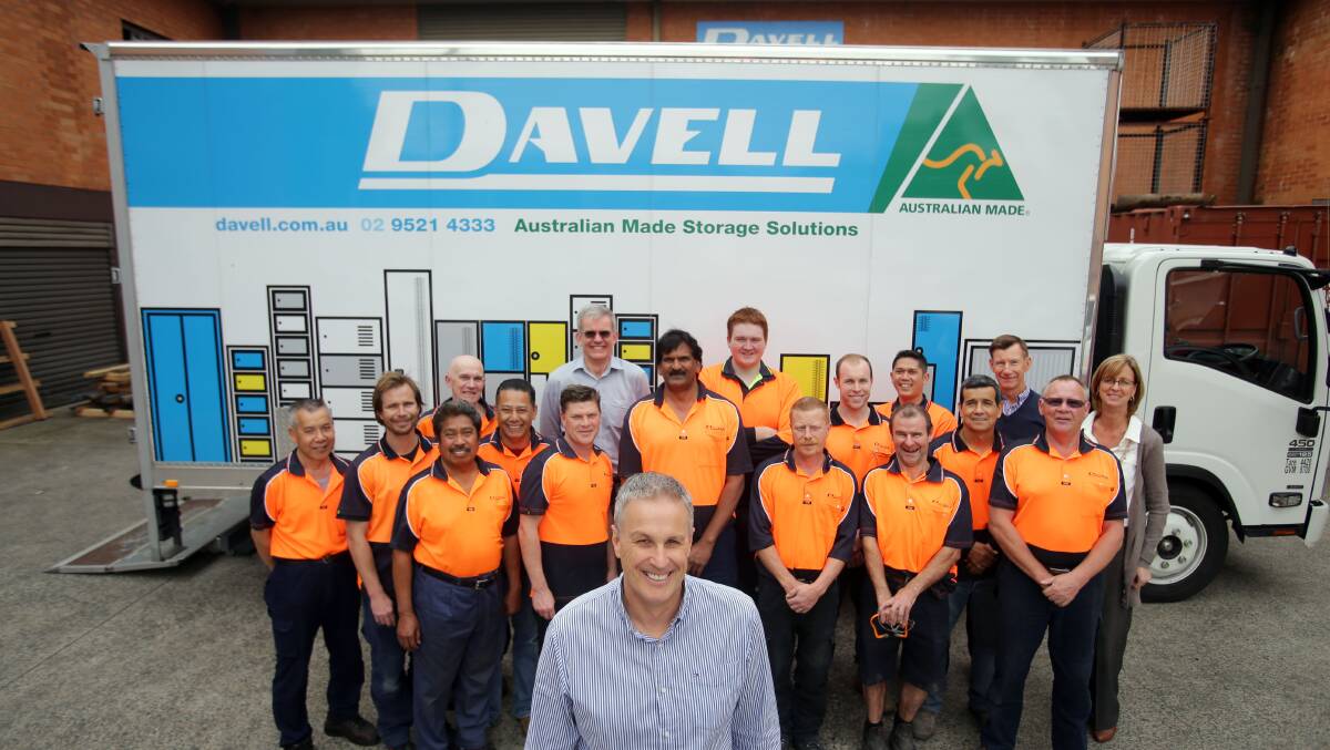 Aussie success story: Davell Products boss Brenton Gray, front centre, with his staff at the company's Kirrawee plant. Picture: Chris Lane
