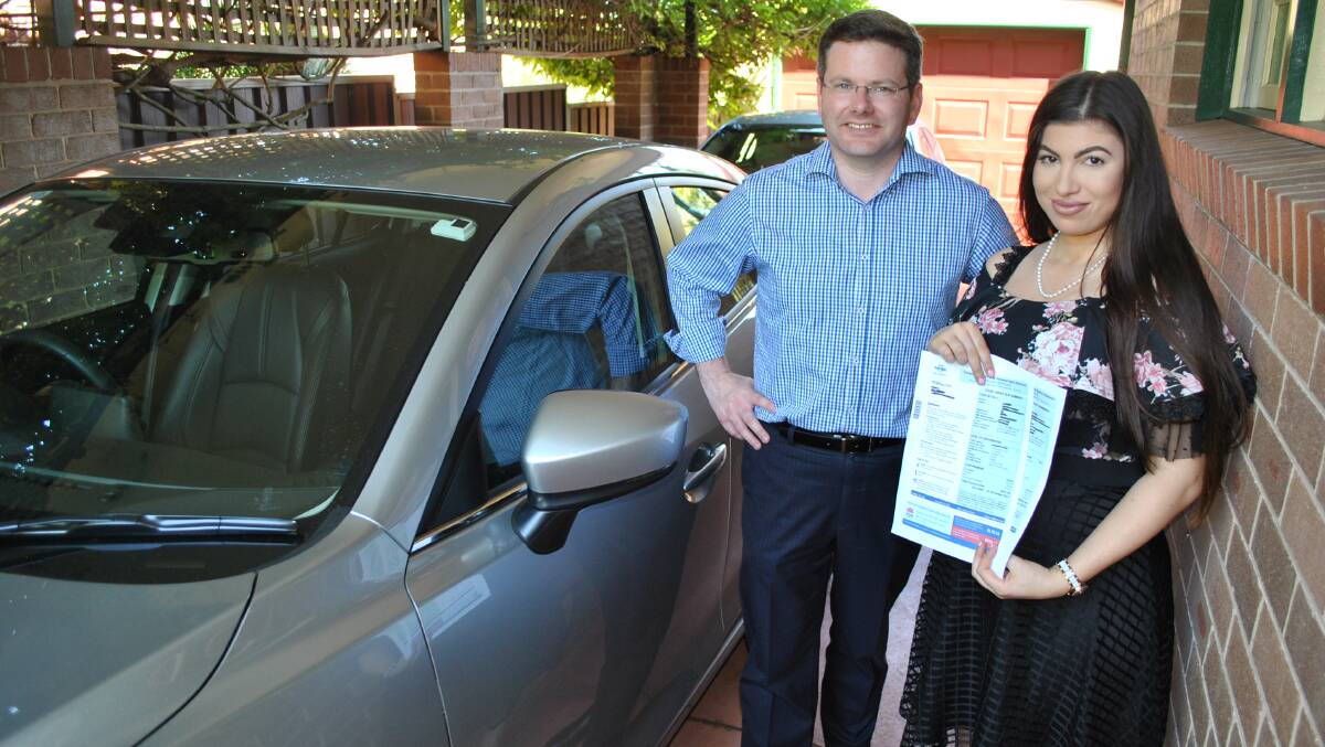 Significant savings: Oatley MP Mark Coure with Sarah Lane, a resident of Hurstville Grove who is one of many Sydney drivers benefiting from these reforms.

 
