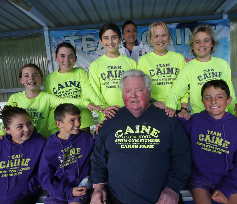 Hero: Dick Caine and swimmers at Carss Park War Memorial Olympic Pool. Picture: John Veage
