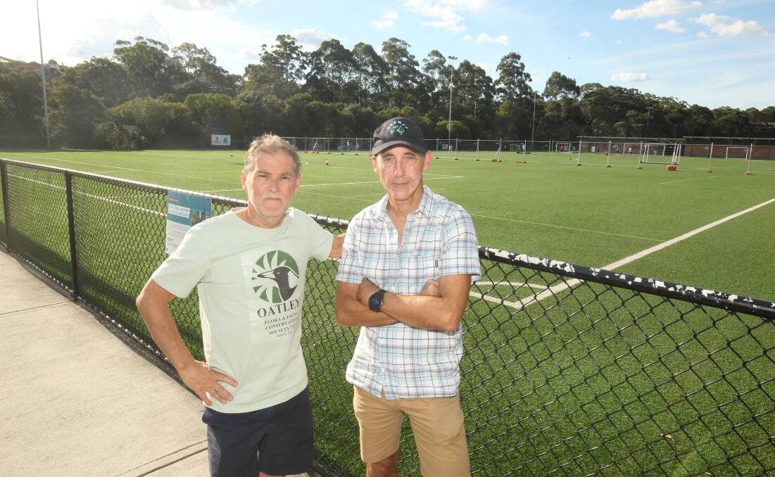 Oatley Flora and Fauna Conservation Society vice-president Adrian Polhill (left) and Dr Scott Wilson at the synthetic field at Poulton Park. Picture: Chris Lane