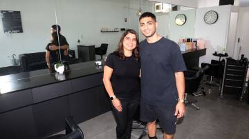 Mother and son team, Giselle and Andrew Sayegh work side-by-side at their salon on Forest Road, Bexley. Picture: Chris Lane