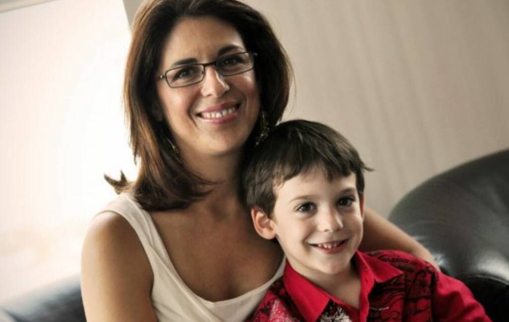 No worries: Allyson Boneham with son Mitchell, 11, has quit the corporate world to start a stress free revolution.