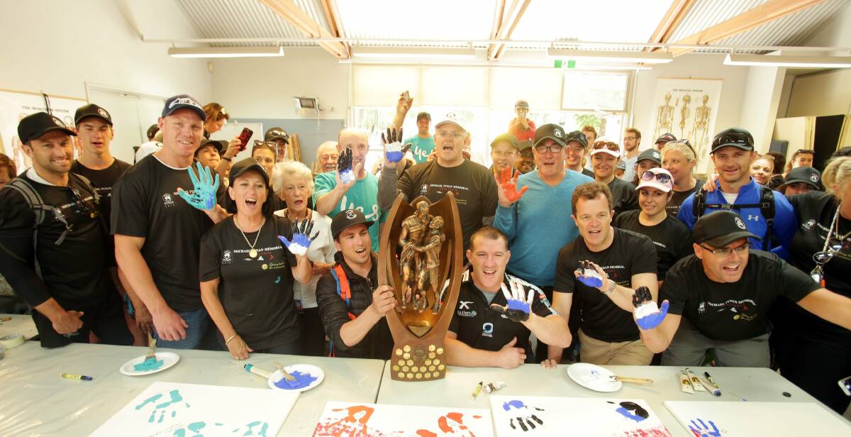 Everyone's a winner: Sharks captain Paul Gallan brought along the Provan-Summons Trophy to inspire participants in the Memorial Challenge. Picture: Chris Lane