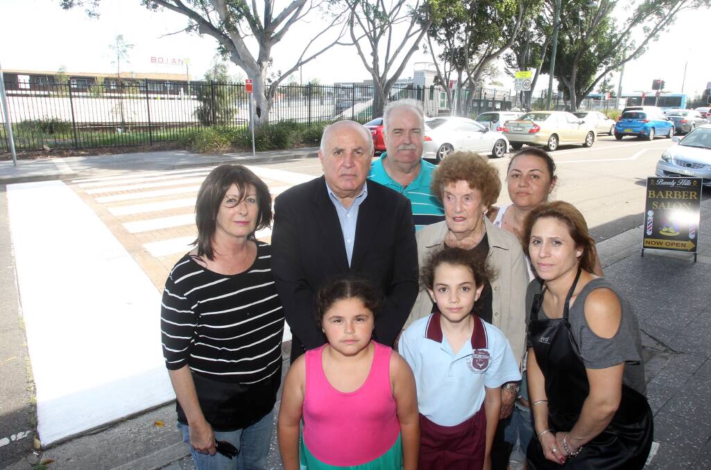 Call to consider pedestrians: Kathryn Calman (left) with Georges River councillor Vince Badalati and fellow Beverly Hills residents at the Tooronga Terrace crossing that is to be removed. Picture: Chris Lane