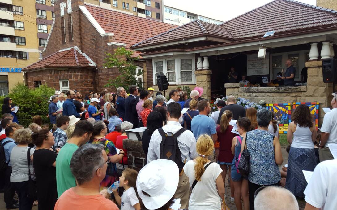 Christmas carols at the Hurstville Baptist Church turned into a community protest against its compulsory acquisition by Georges River Council.