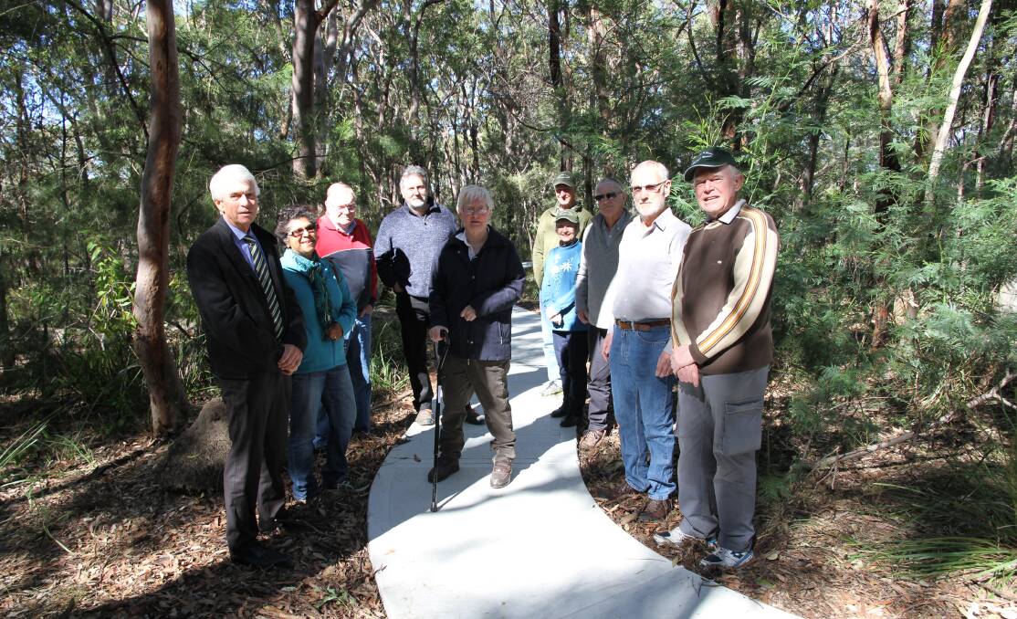 New path: Georges River Council administrator John Rayner (left) with members of the Oatley Flora and Fauna Conservation Society inspecting the new wheelchair accessible pathway.