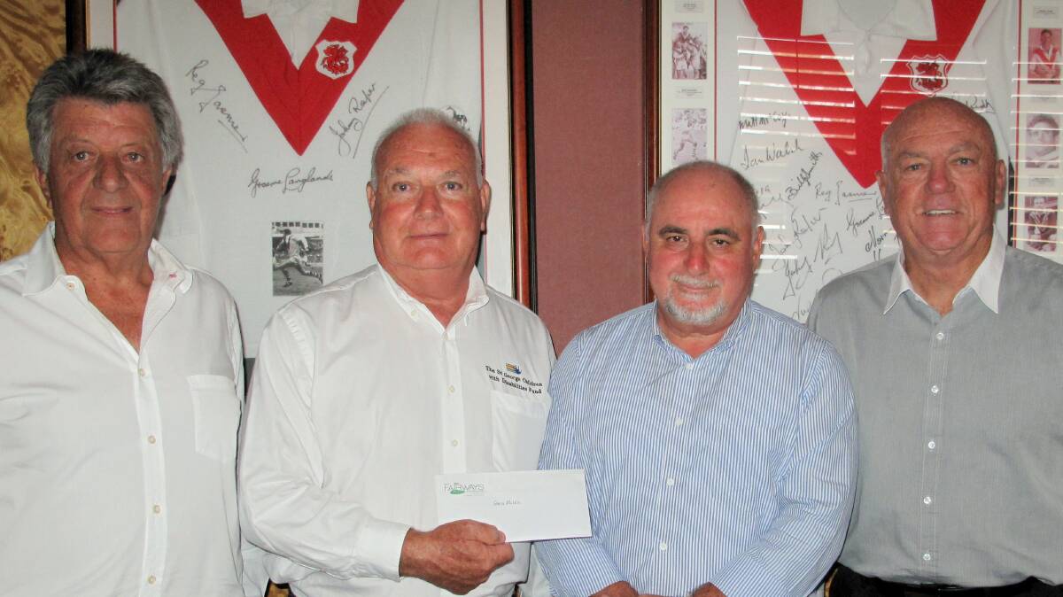 Generous support: Presenting the cheque for $50,000, left to right, Ralph Piggott , St George Leagues Club; Garry Morris OAM, St George Children with Disabilities Fund Inc; Albert Salerno, Chairman, Fairways Fundraising Group; Danny Robinson, St George Leagues Club.