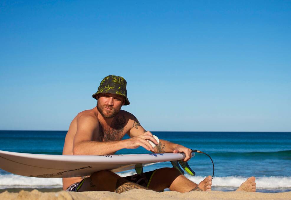 Hip hopping to the top: Cronulla surfer and rapper Todd Mingramm, also known as Slippery, is celebrating the success of his new single, Surfboard. 