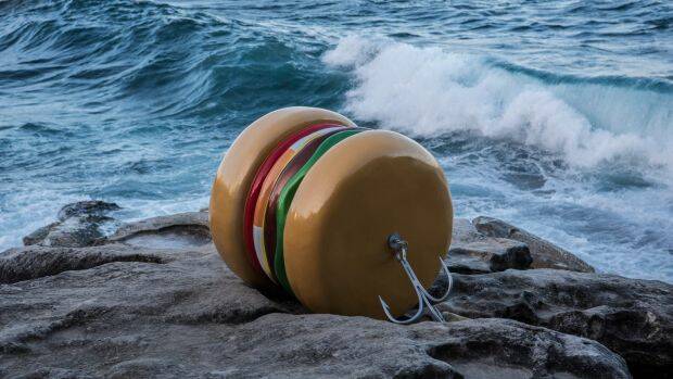 Social-environmental commentary: James Dive's giant fibreglass hamburger on a fishing line. Photo: Wolter Peeters