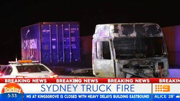 A truck burst into flames on the M5 motorway on Friday morning, causing traffic delays. Photo: Supplied/Nine News