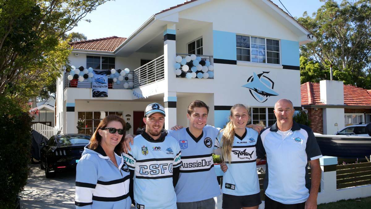 Passionate supporters: Michelle, Jake, Harry, Lucy and Steve Waters. Picture: John Veage