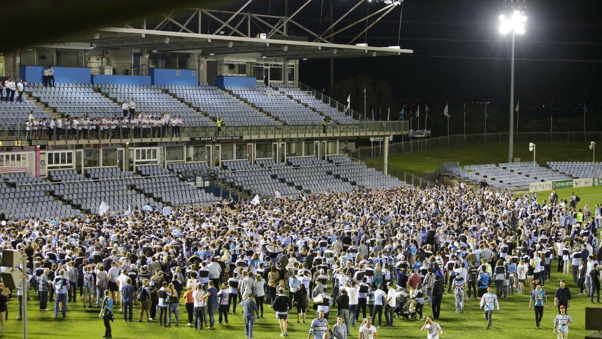 Sharks fans were on hand to greet their grand final heroes when they returned to the shire.
Picture: John Veage