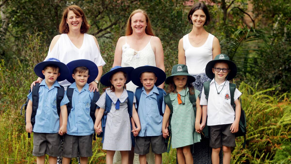 PROUD MUMS: Twins, from left, Joshua, Ethan, Zara, Hayden, Isabella and Dylan are ready for their first day at school, with mums, from left, Telina, Louise and Nicole.