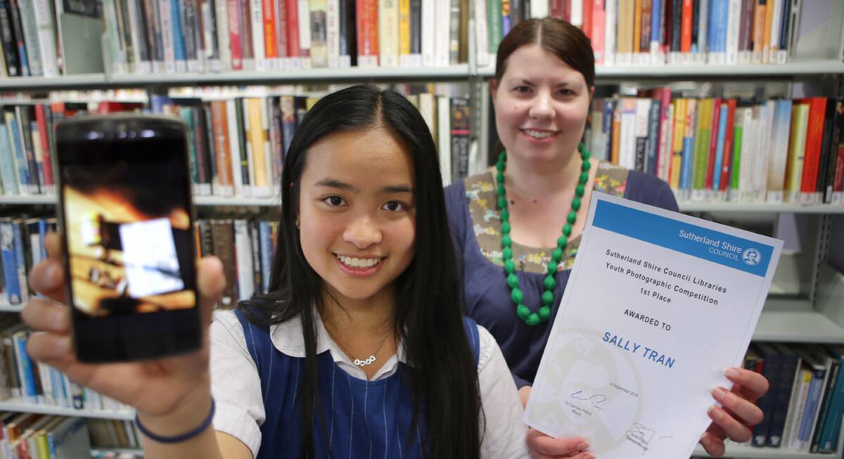 Winner: Woolooware High student Sally Tran with Alison the Children's and Youth officer at Sutherland Library. Picture John Veage