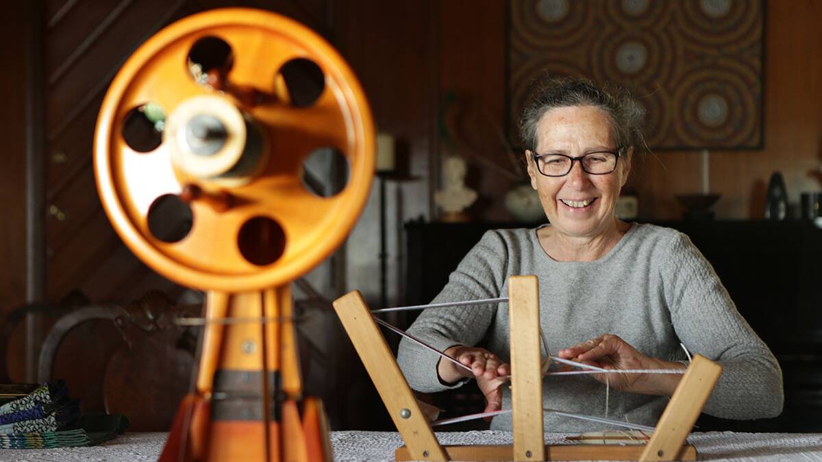 Craft : Spinners and Weavers member Susan Duyker operating a simple old style Inkle loom.Picture John Veage