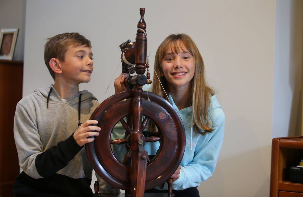 Young spinners: Lara and Nicholas Davis learnt to spin from their grandmother in the school holidays, weaving with a children's loom. Picture: John Veage