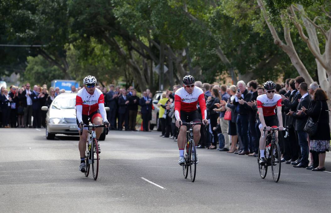 Farewell Stephen: St George cyclists, Greg O’Brien, Kevin Margetson and Ben Dutton pedaled ahead of the cortege to Woronora. Picture: John Veage