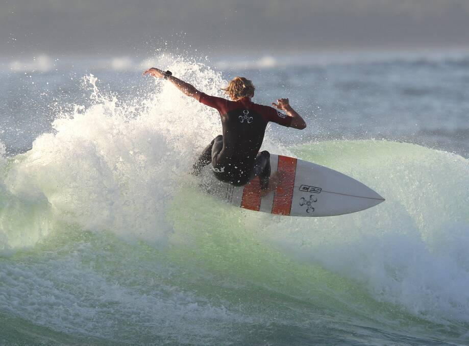 Blasting off: Talented young South Cronulla surfer Dion Earle took out the junior prize in the first Sandshoes Boardriders Club contest of the year. Jarrod Horner won the open division. Picture: John Veage
