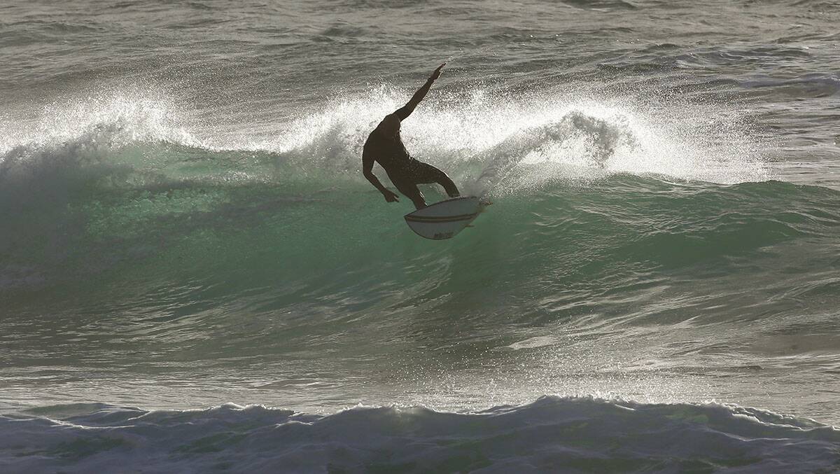 Good lefts at the Wall: Bevan makes the most of it. Picture: John Veage