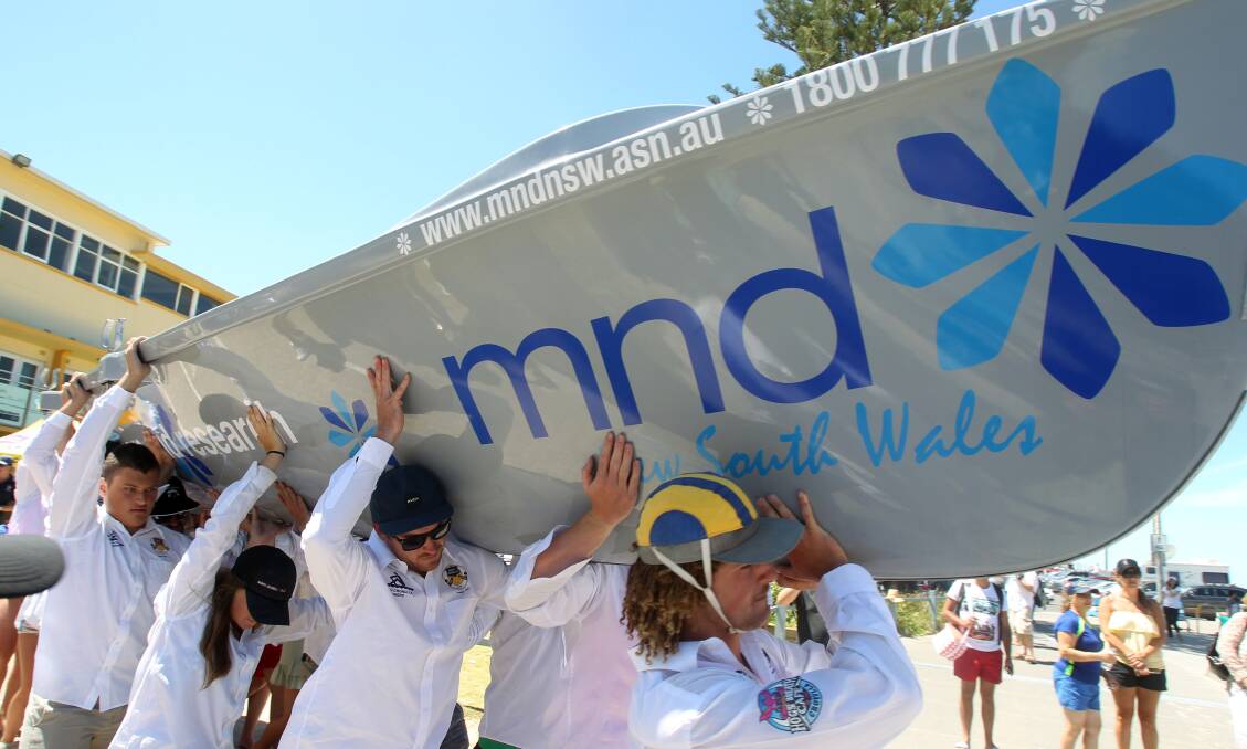 New Surfboat: One charity, the North Cronulla SLSC, supporting another charity MND NSW. Picture: Chris Lane
