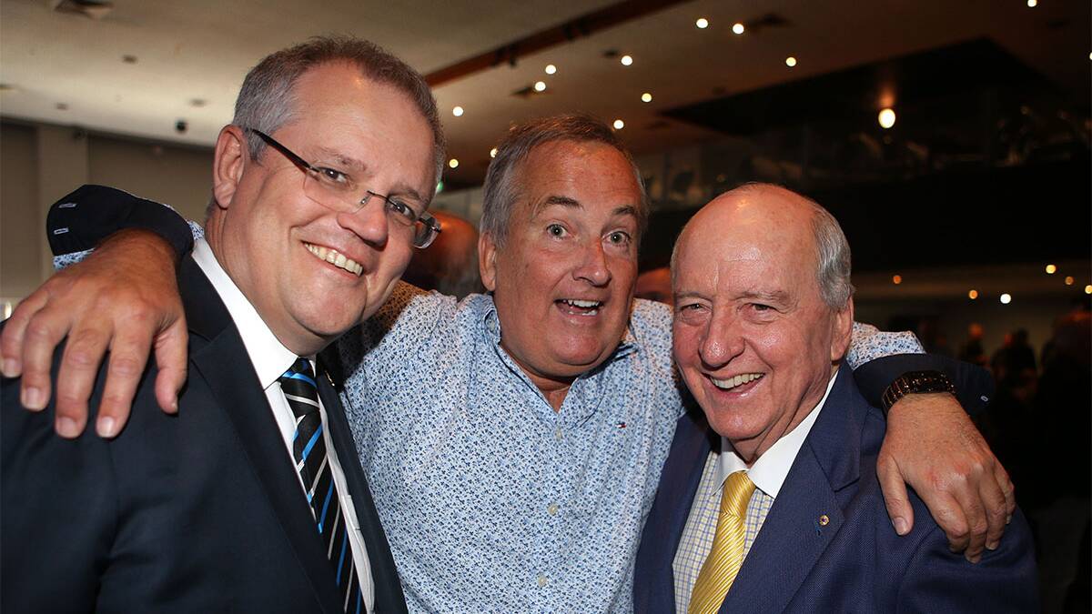 Funny man: Federal Treasurer Scott Morrison and radio king pin Alan Jones meet the man of the moment at "Wheels late lunch".Picture: John Veage