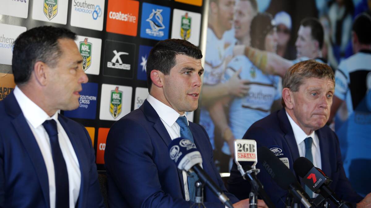 Hard choice: Ennis was joined by Sharks head Coach Shane Flanagan and the Club's Group CEO Lyall Gorman. Picture: John Veage