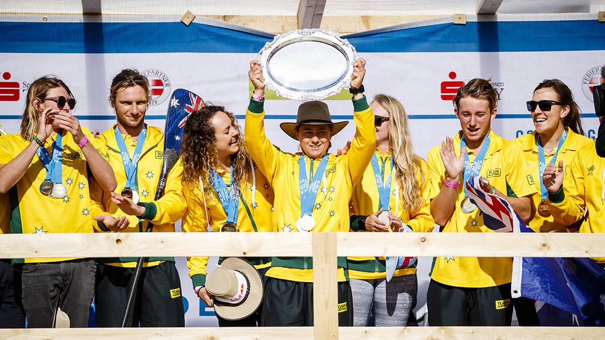 Team Australia celebrates their fifth Team Gold Medal in the event's six years, continuing their streak of dominance. Picture ISA/Ben Reed