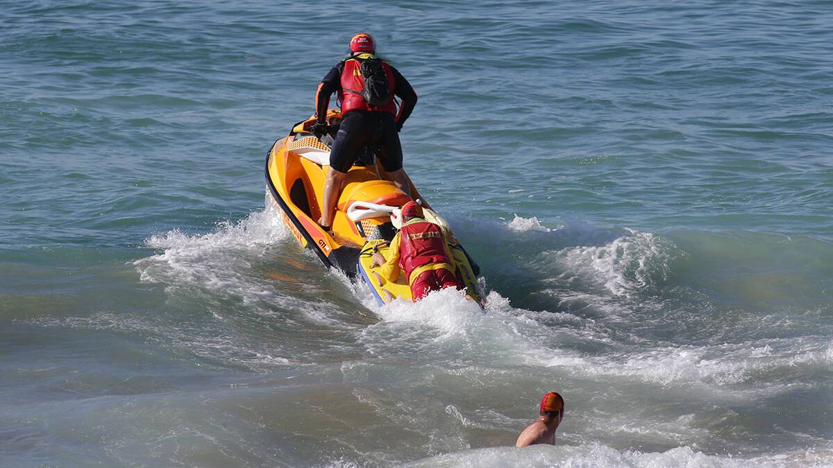 Alert: At Wanda Beach Surf Lifesavers on jet skis were called upon to watch for swimmers caught in any rip's. Picture: John Veage