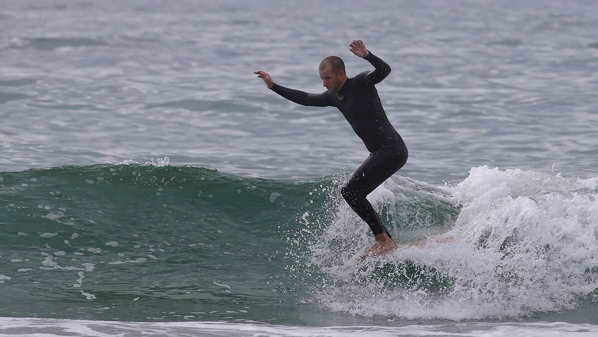 Small waves on offer this week for Matt Mulder and his old Mal.Picture John Veage