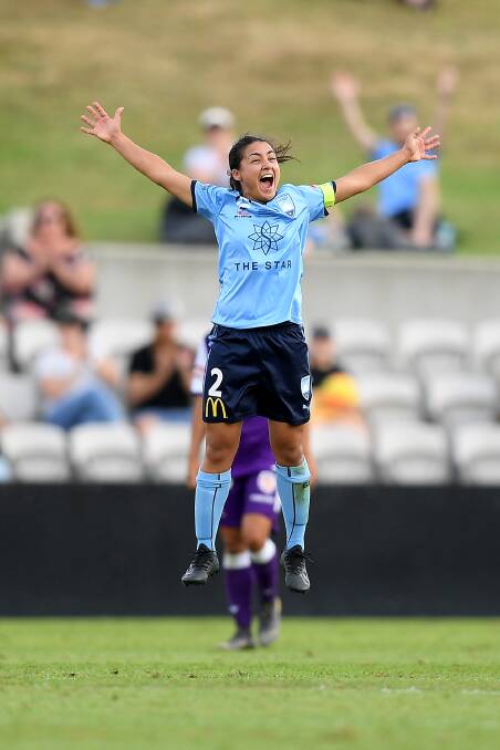 Walking on air: Sydney FC captain and St George junior Teresa Polias celebrates at full-time of the W-League grand final at Kogarah on Saturday. Picture: AAP Image