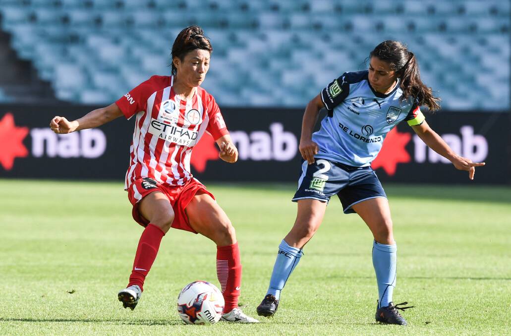 Warrior: Sydney FC captain Teresa Polias battles for the ball in the middle of the park in Sunday's W-League grand final. Picture: Brendan Esposito/AAP
