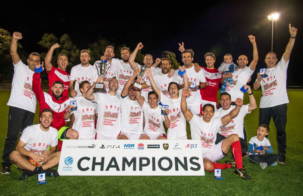 Champions: St George FA celebrate their penalty shootout victory over Hurstville FC at Valentine Sports Park on Saturday. Picture: George Loupis/Football NSW