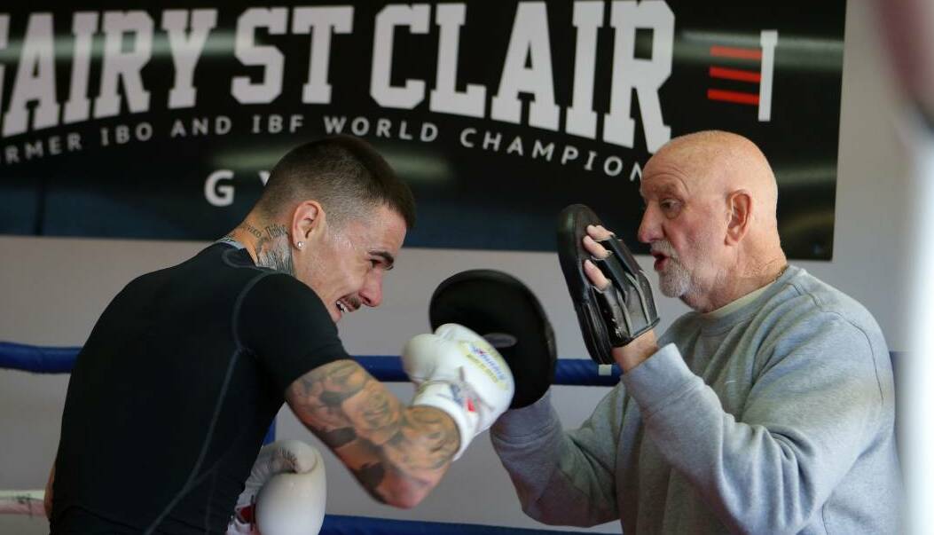 George Kambosos Junior working with legendary boxing trainer Johnny Lewis last month. Picture: John Veage
