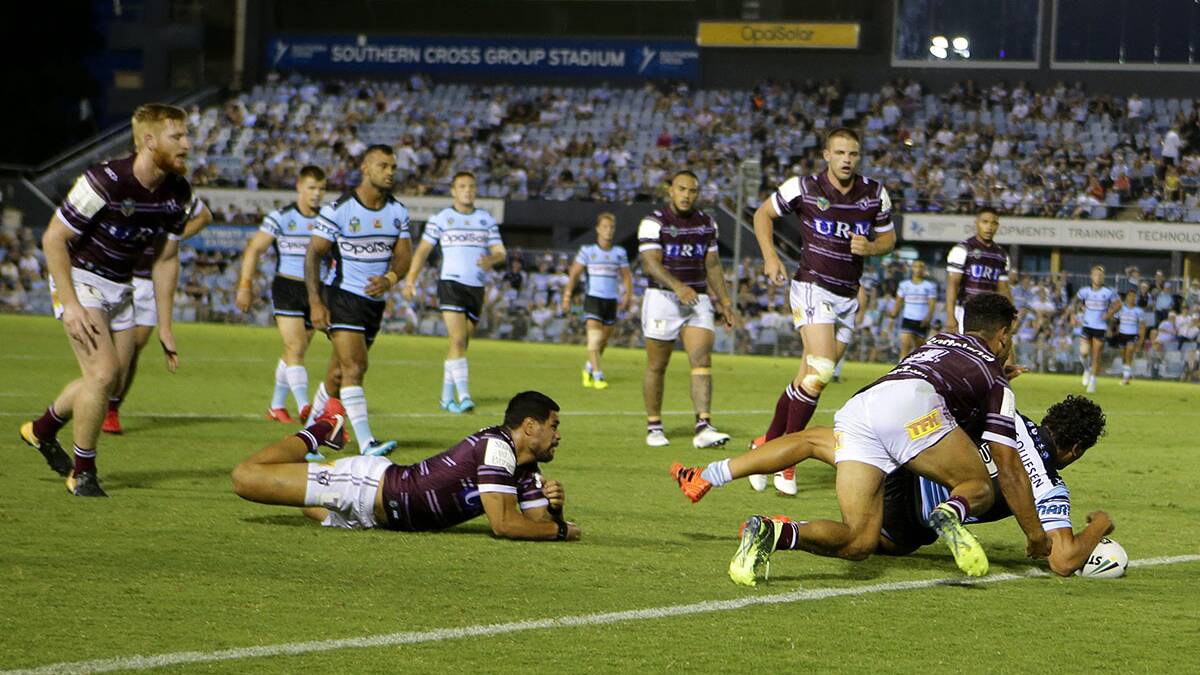 Jesse Ramien scores for Cronulla in their trial against Manly on Saturday night. Picture: John Veage