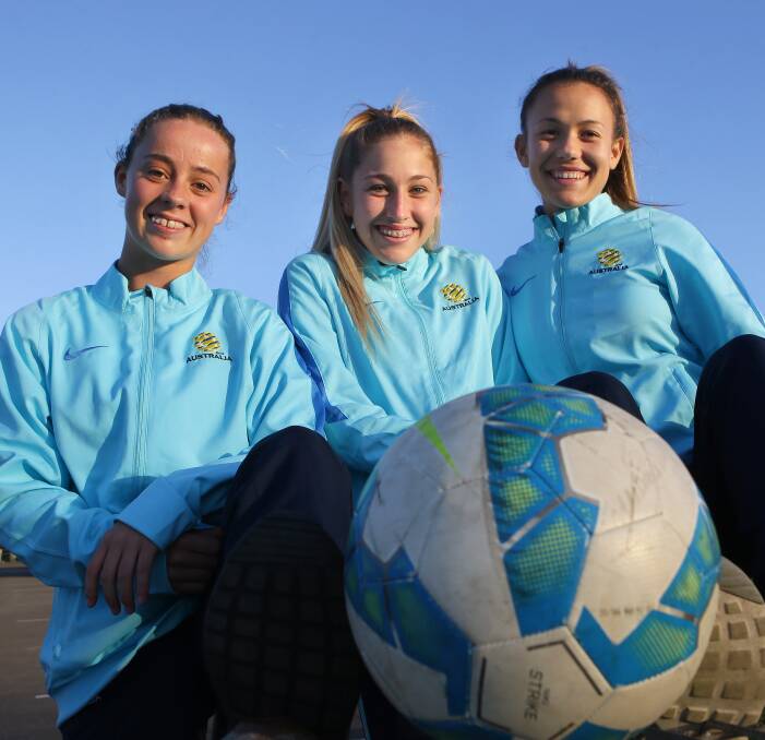 Mini Matildas: Sutherland juniors Jess Meads (left), Gracie Johns and Angelique Hristodoulou will play for Australia's under-17s team in the AFC under-16s qualifiers in Vietnam. Picture: John Veage