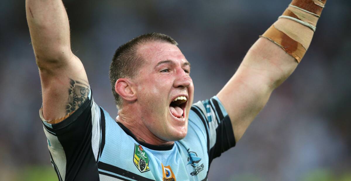 Legend: Cronulla Sharks captain Paul Gallen, who has been at the club for 17 years, celebrates the moment of victory. Picture: John Veage