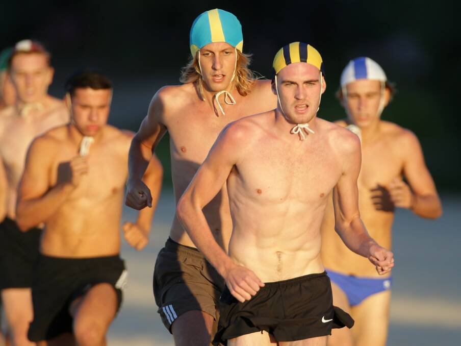 Oliver's Army: North Cronulla's Oliver Hoare storms to his fifth Australian 2km beach run title. Picture: John Veage