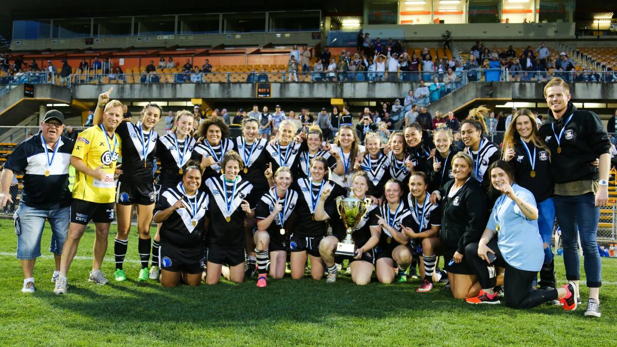 Champions: Cronulla Caringbah Sharks celebrate their SMWRL premiership. Picture: NSWRL