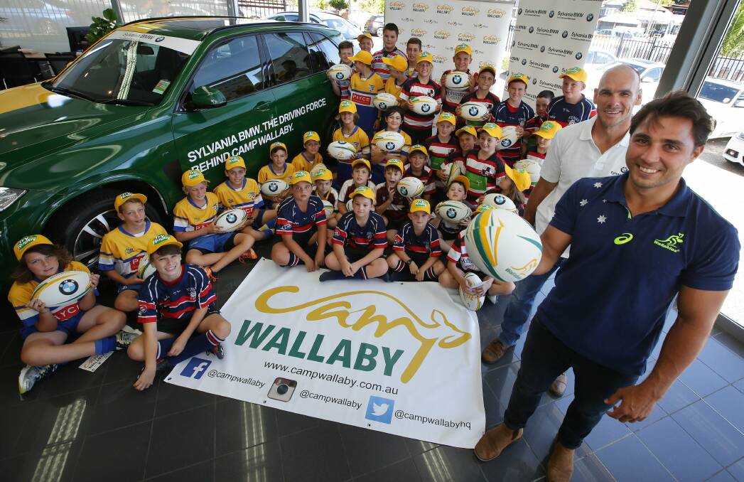 Future Wallabies: Australian Test scrum-half Nick Phipps with former Wallaby Nathan Gray at the launch of Camp Wallaby to be held in the Shire. Picture: John Veage