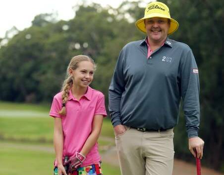 Charlotte with professional golfer Jarrod Lyle at Kareela in May. Picture: John Veage
