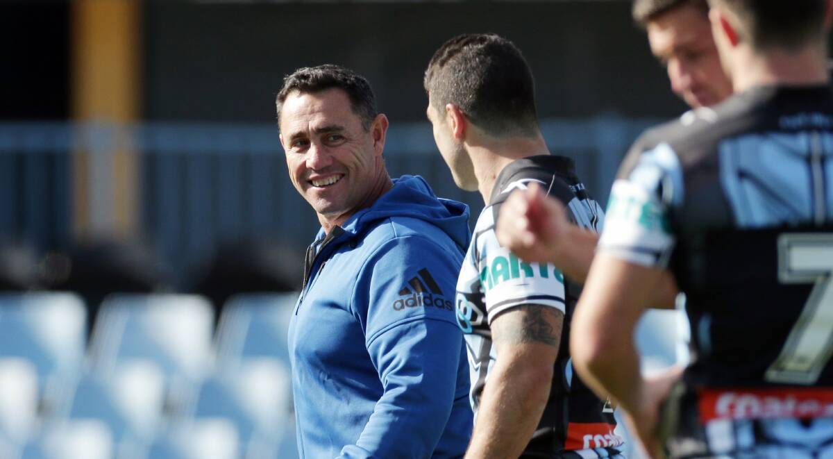 Leader: Shane Flanagan shares a laugh with Michael Ennis at training during the year. Picture: Chris Lane