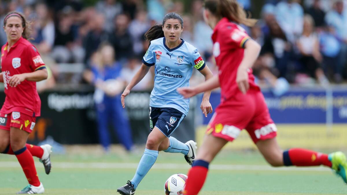 Star: Sydney FC W-League captain Teresa Polias on the ball against Adelaide United in front of a bumper crowd at Seymour Shaw Park last season. Picture: Chris Lane