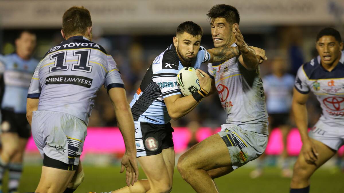 Strong: Sharks centre Jack Bird in action against the Cowboys. Picture: John Veage