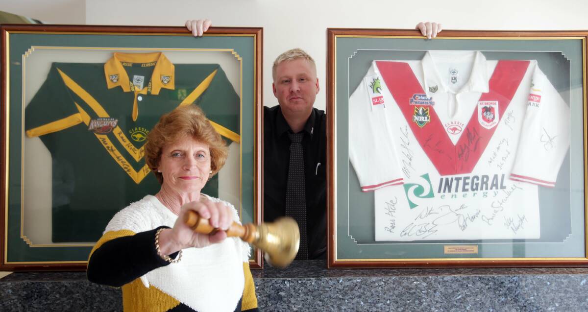 Celebration: Arncliffe Scots secretary Glenys Ellis (left) and Scots Club general manager Robert Malpass with some of the league club's memorabilia. Picture: Chris Lane